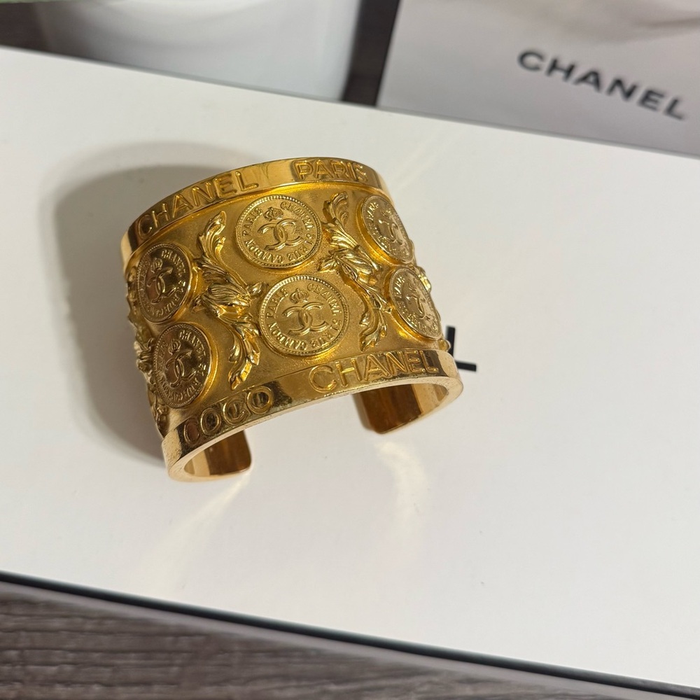 RARE GOLD-PLATED CHANEL CC FILIGREE MEDALLION CUFF BRACELET